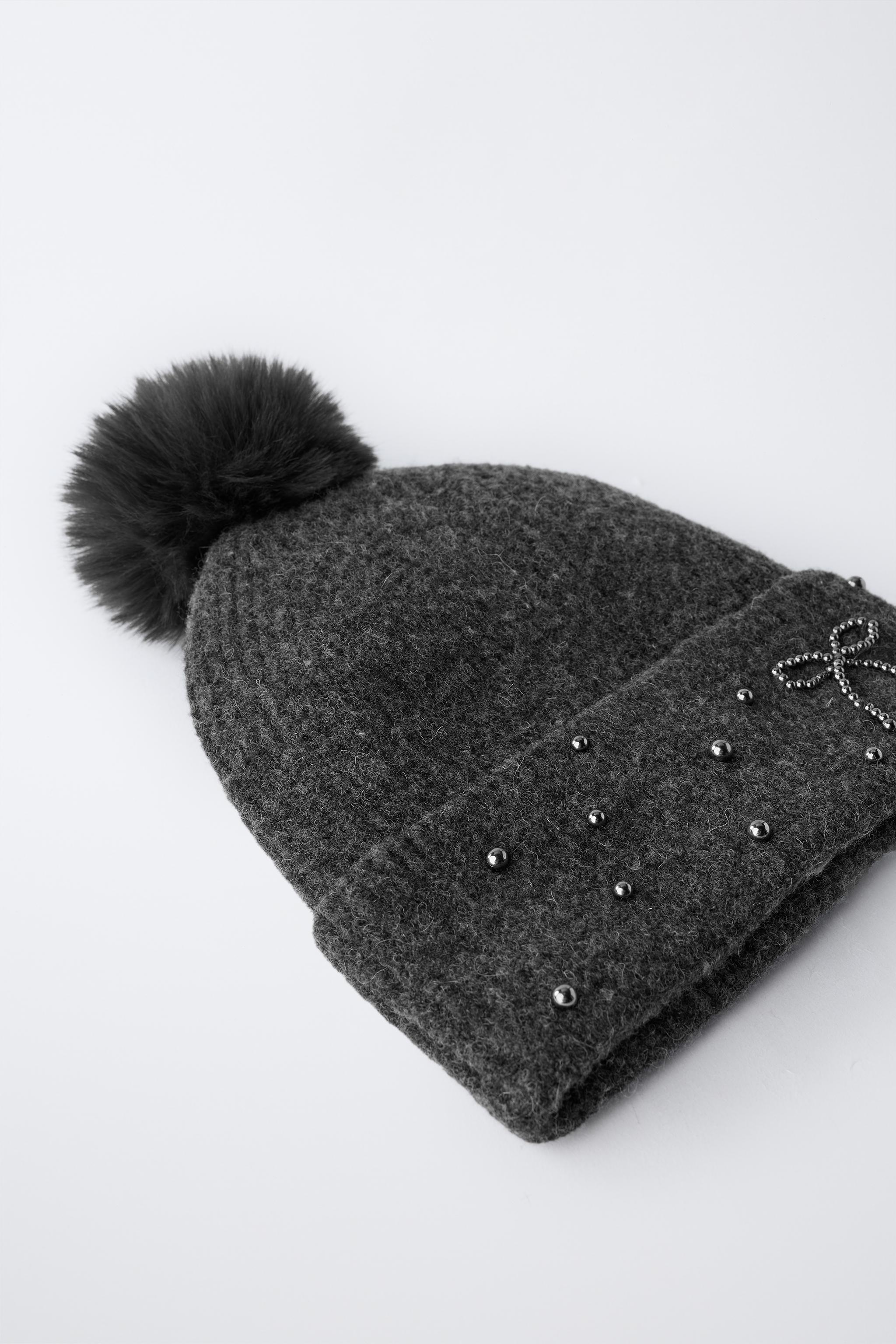 BONNET EN MAILLE BRILLANT À POMPON AVEC LAINE